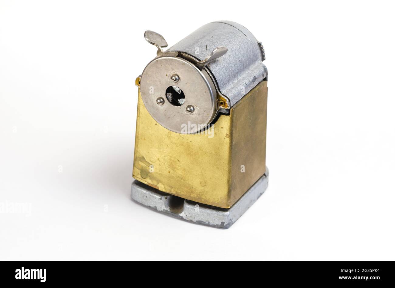 Vintage pencil sharpener on white background. Manual metal tool for  sharpening wooden pencils. Selective focus Stock Photo - Alamy