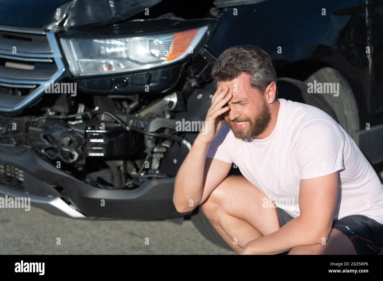 sad man driver at broken car after automobile collision car accident, car damage Stock Photo