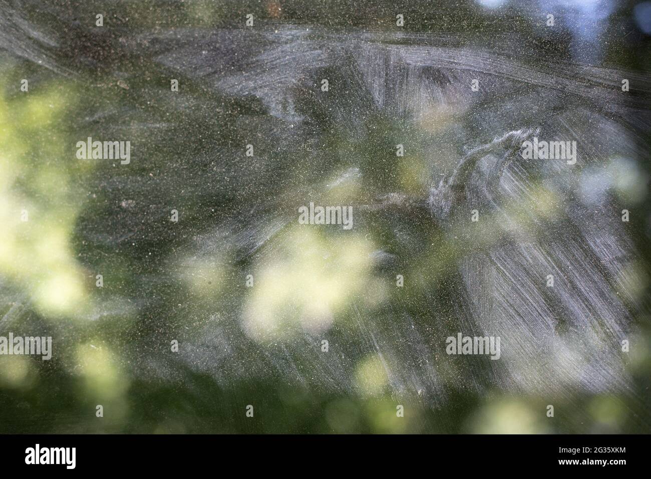 Dirty glass on the window. Cloudy glass covered with dust. Dirty