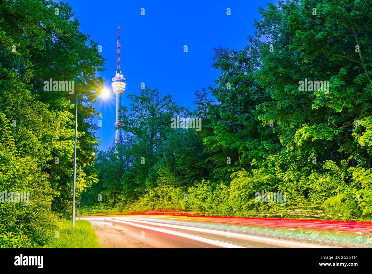 Germany, Stuttgart cityscape of illuminated television tower building ...