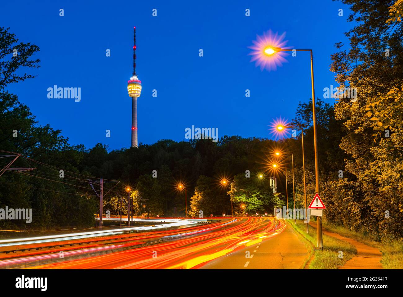 Germany, Stuttgart city skyline and highway with traffic of cars by ...