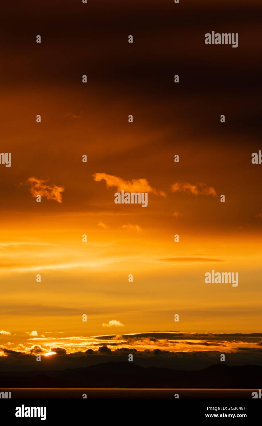 Sunset sky with orange clouds. Nature background Stock Photo - Alamy