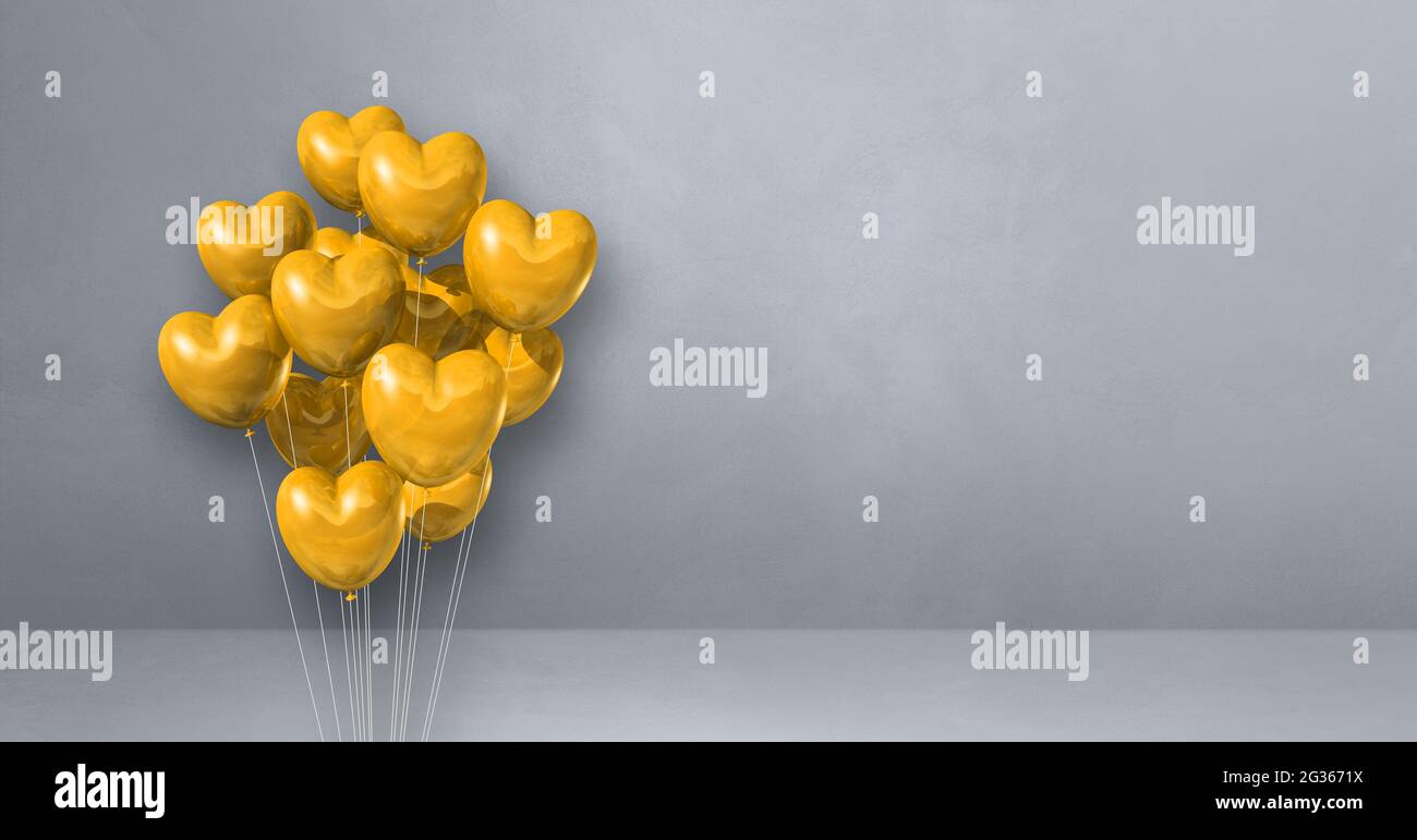 Yellow heart shape balloons bunch on a grey wall background. Horizontal ...