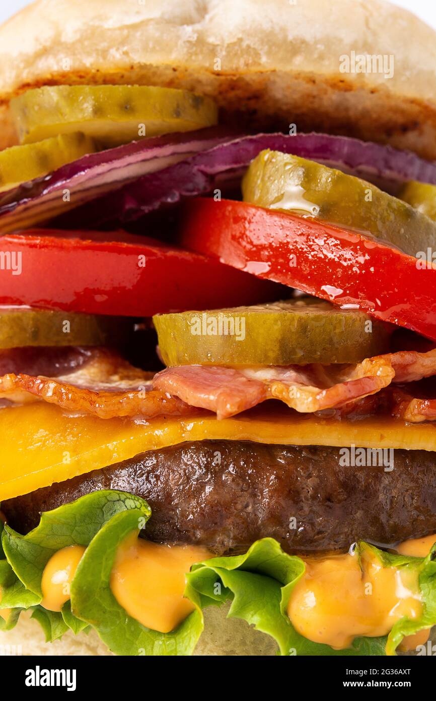 Beef burger with bacon isolated on white background Stock Photo