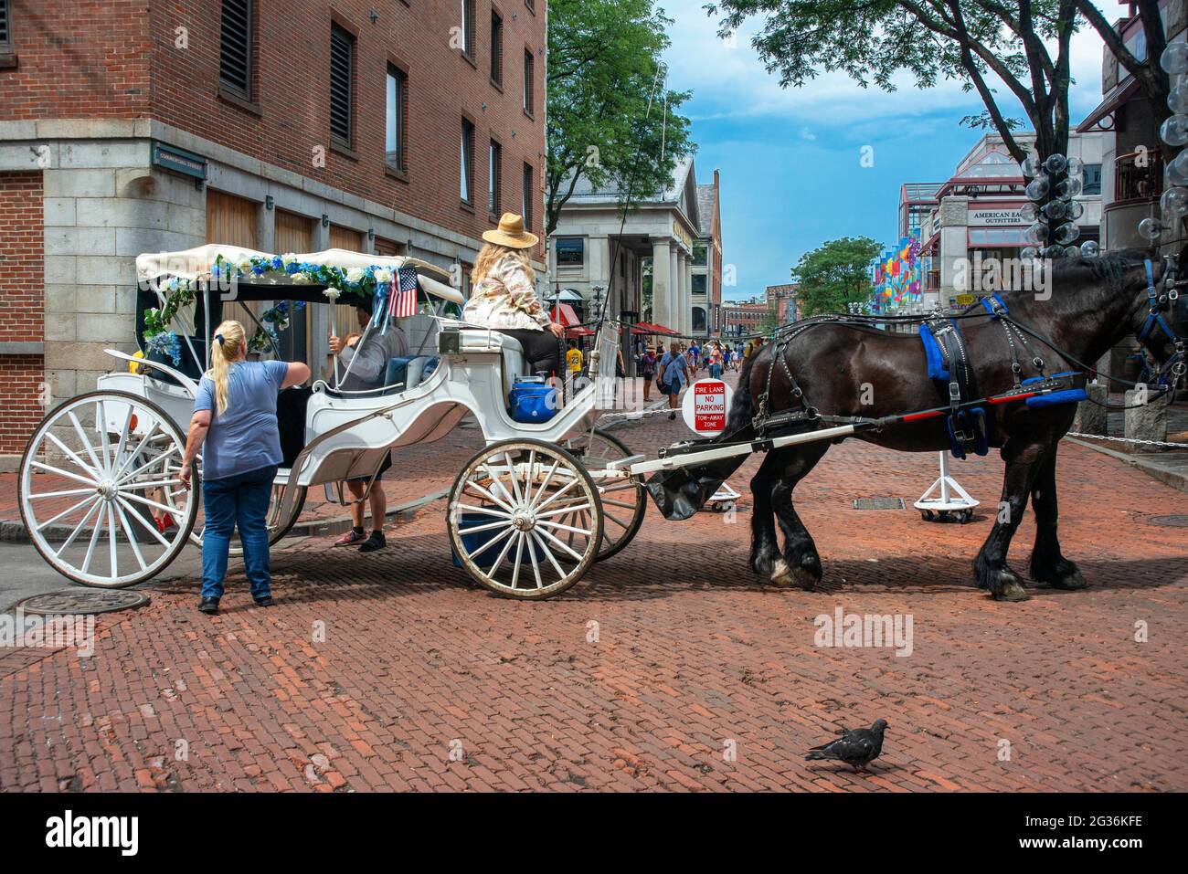 Boston horse carriage tour near Quincy Market and Faneuil Hall in Freedom Trail Boston Massachusetts. Built in early 1800s as one of the largest marke Stock Photo