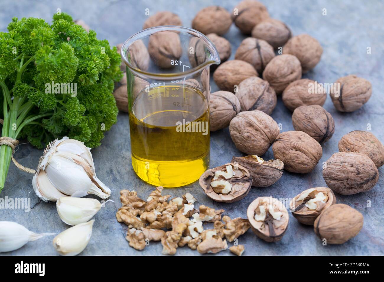 walnut (Juglans regia), ingredients for a walnut pesto Stock Photo