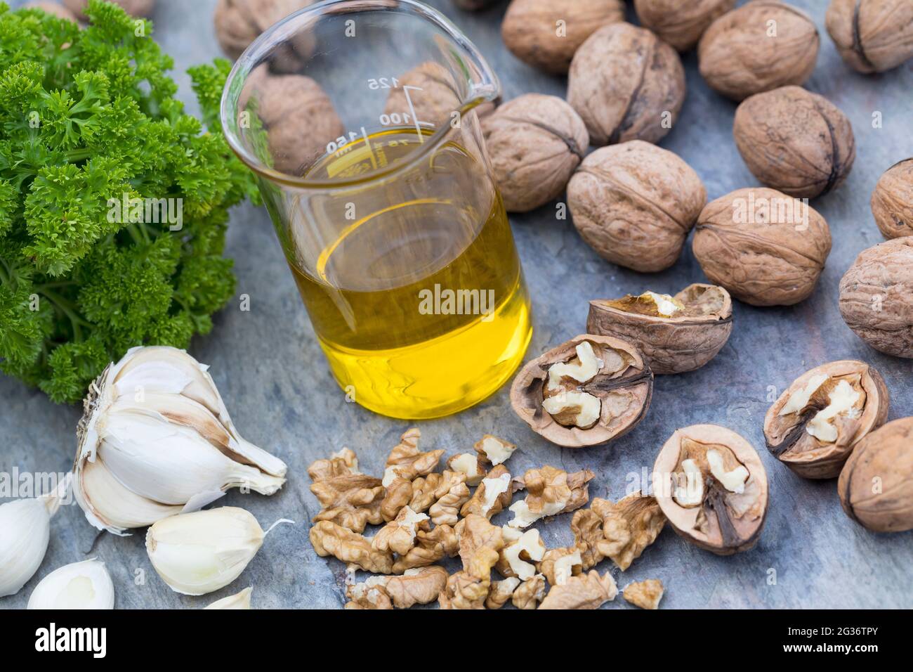walnut (Juglans regia), ingredients for a walnut pesto Stock Photo