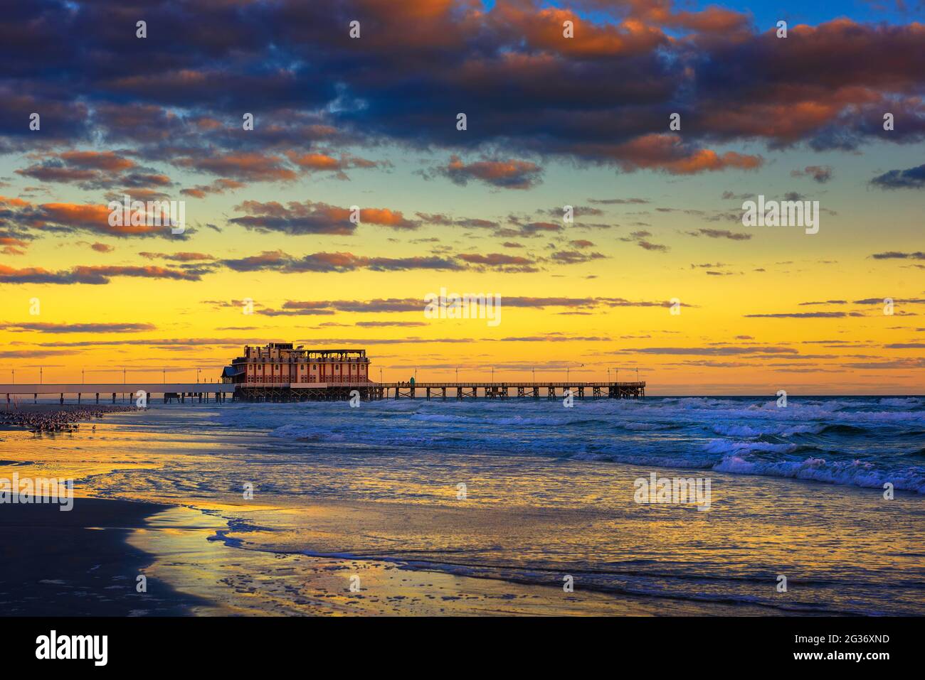 Sunrise above Daytona Beach Main Street Pier, Florida Stock Photo