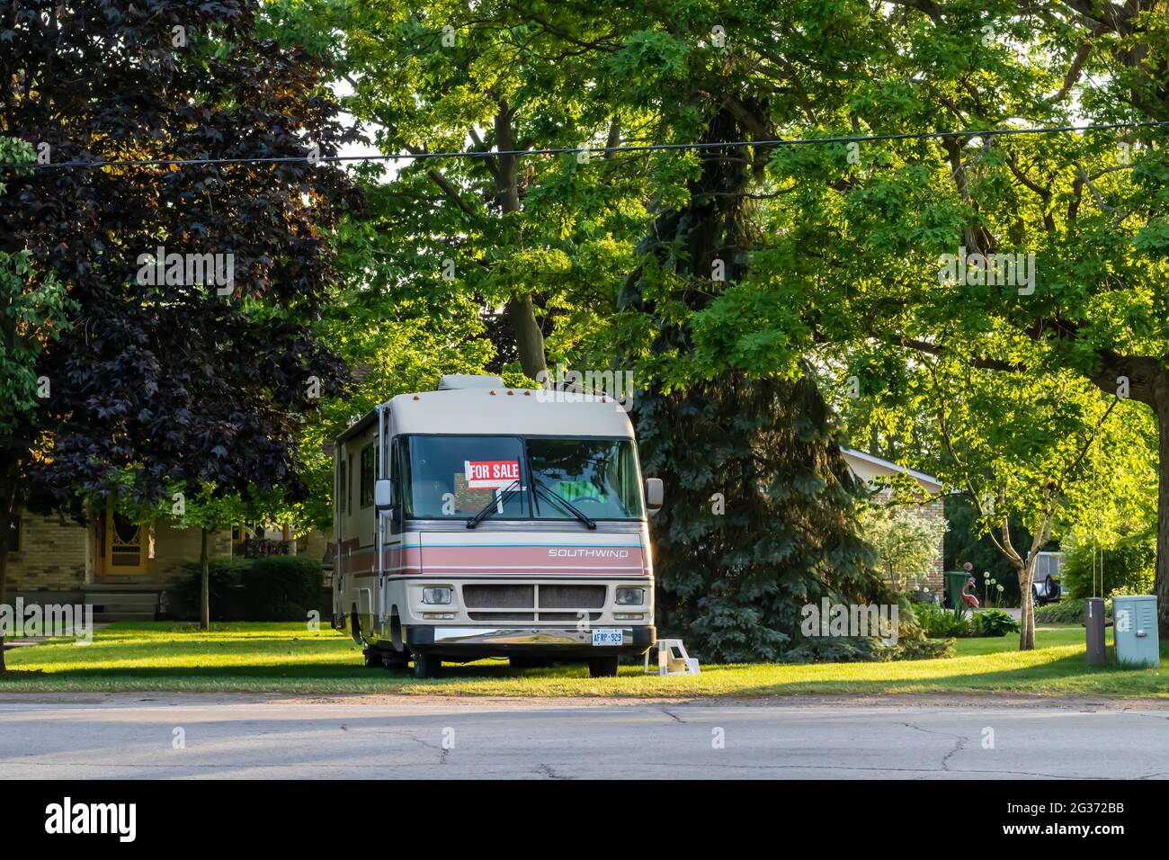 St. Thomas, Ontario, Canada - June 4 2021: Southwind brand recreational vehicle camper van with a for sale sign on the windshield. Stock Photo