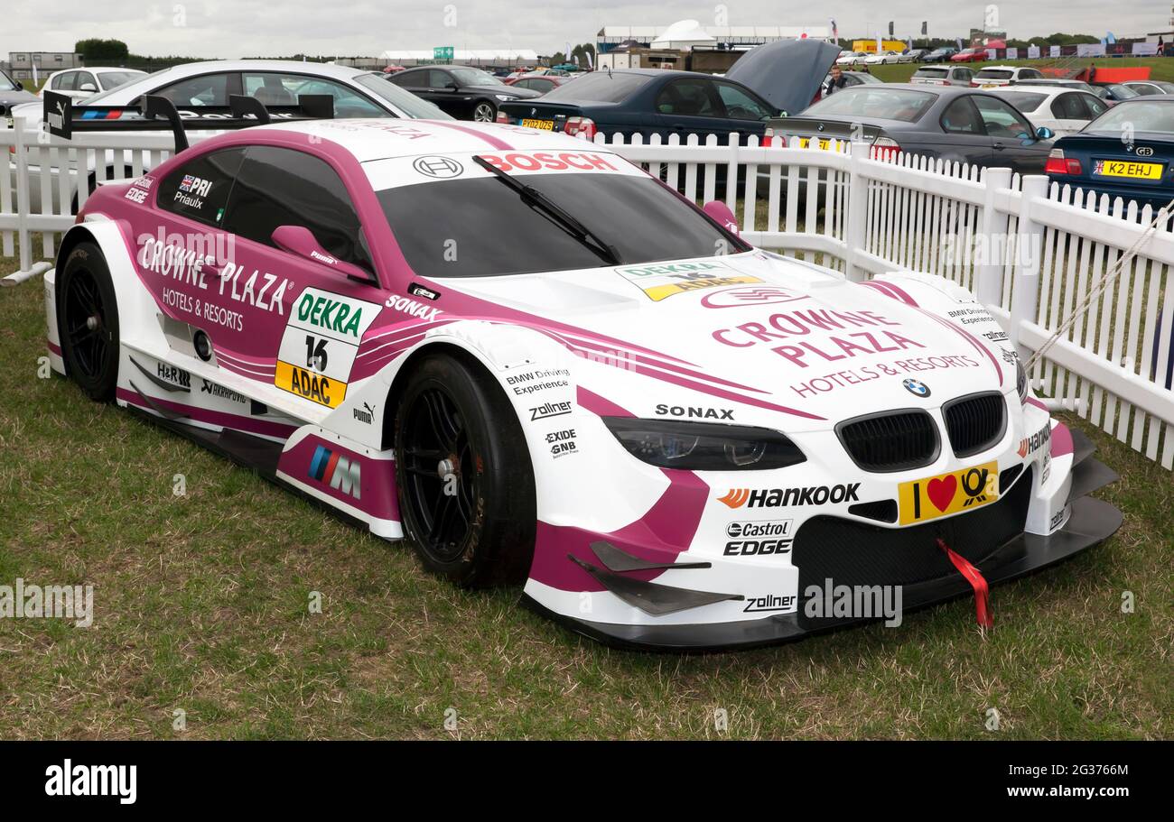 Three-quarter front view of Andrew Priaulxs' BMW  M3 DTM, on display at the Silverstone Classic 2017 Stock Photo
