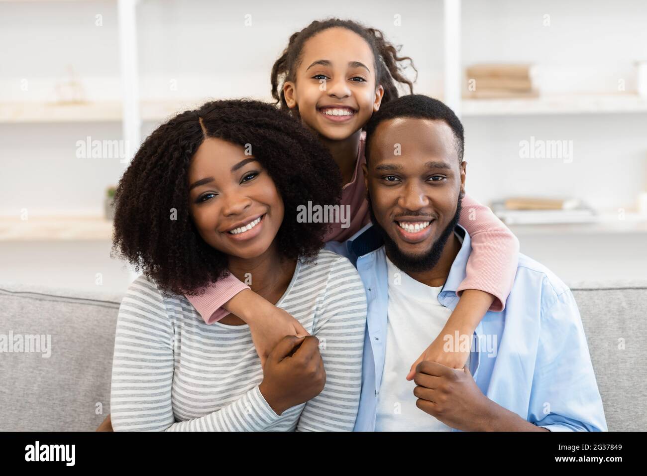 Portrait of happy black family smiling at home Stock Photo - Alamy