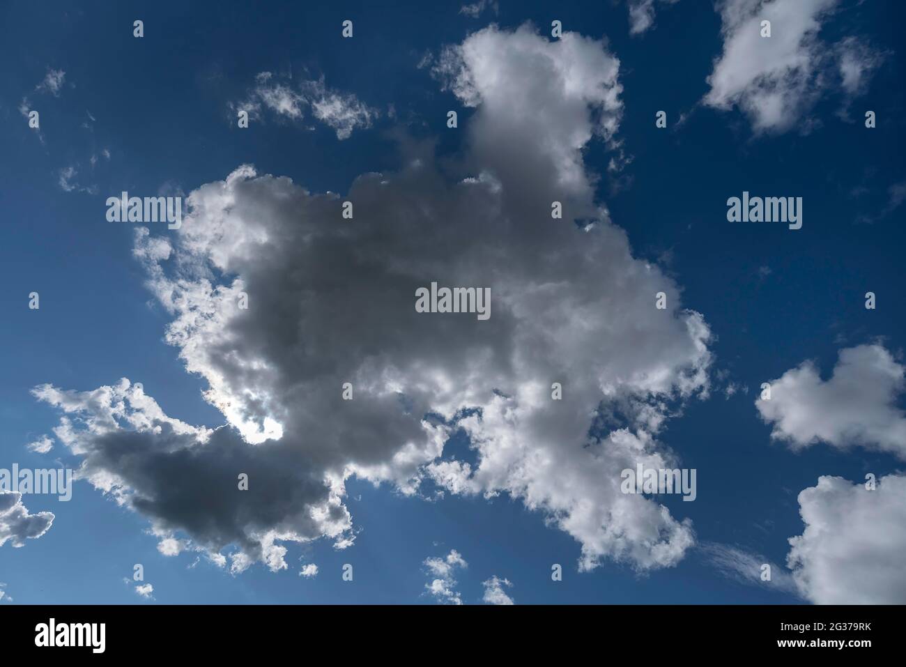 Sun (Nimbostratus cloud) behind a rain cloud, Bavaria, Germany Stock Photo