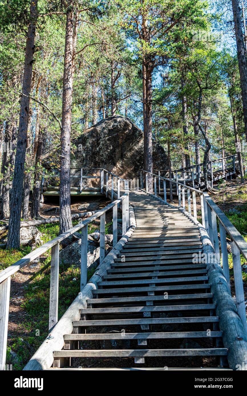 Wooden stairs to the 'Bear's Den' Tafone Rock, Lapland, Inari, Finland Stock Photo