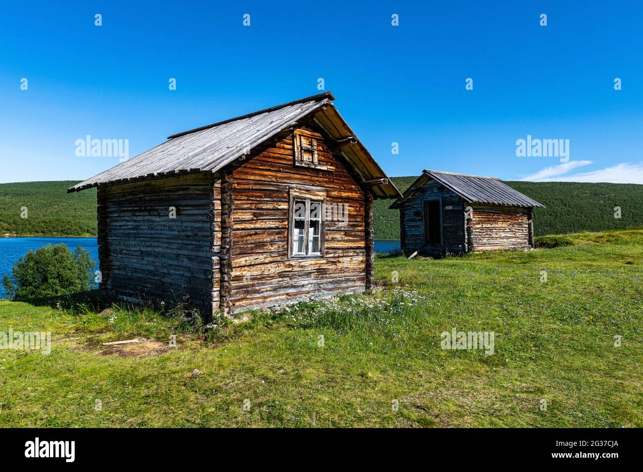 Historic houses on the Karasjohka river bordering Norway and Finland, Lapland, Finland Stock Photo