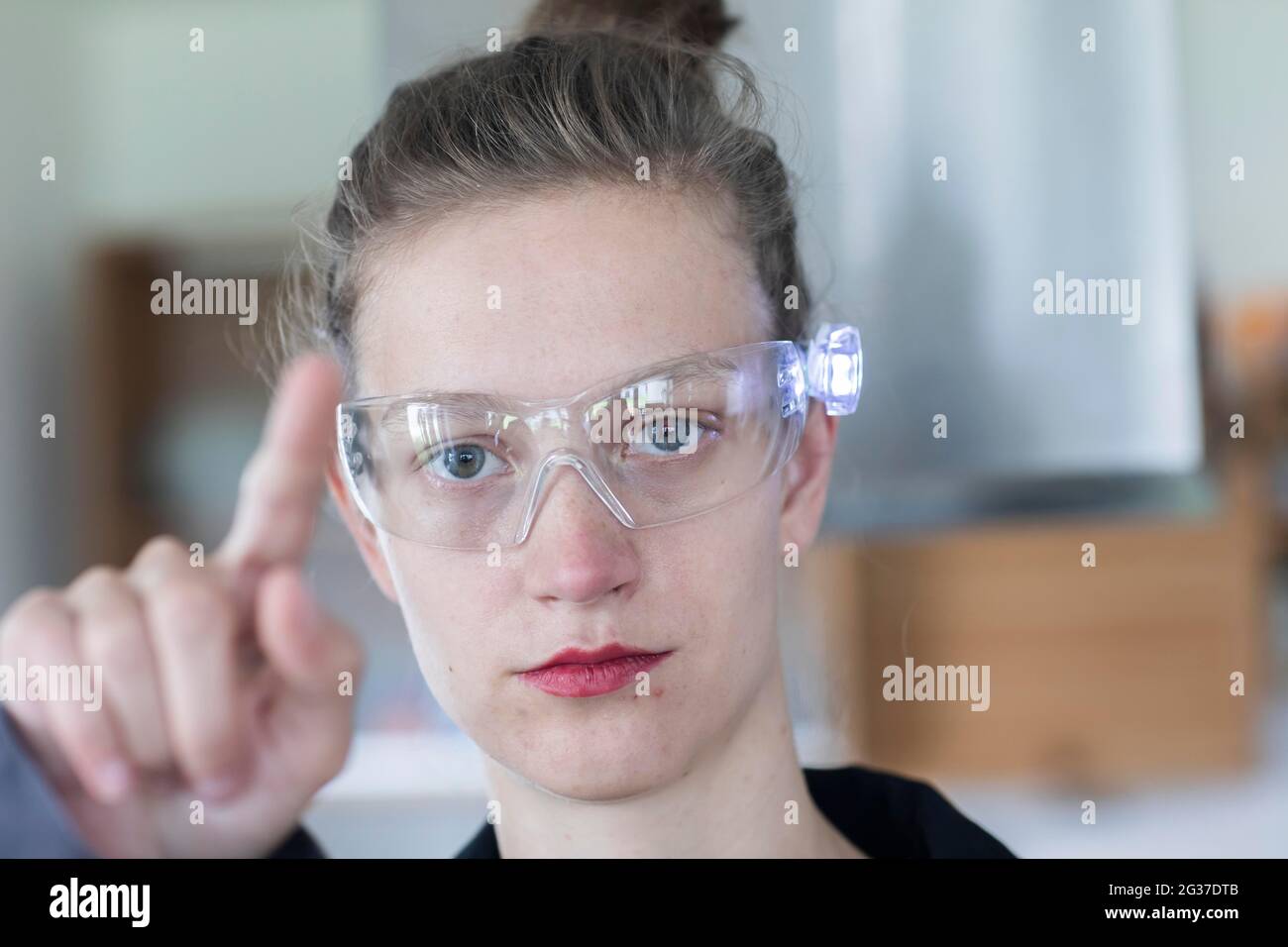 Young logistician working with scan glasses, Freiburg, Baden-Wuerttemberg, Germany Stock Photo