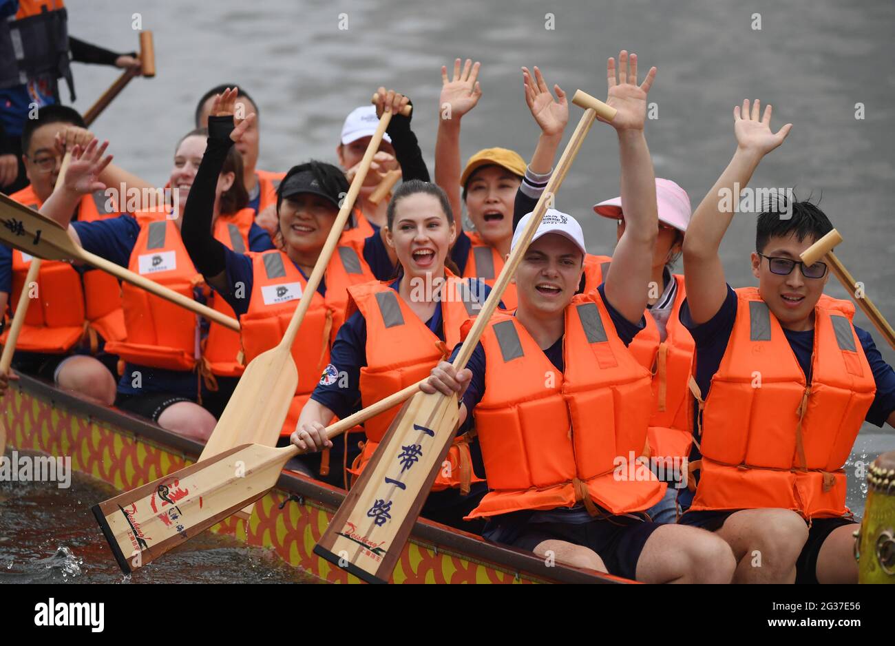 Tianjin, China. 14th June, 2021. Participants celebrate after a dragon boat race to celebrate the Dragon Boat Festival in Tianjin, north China, June 14, 2021. China celebrated the Dragon Boat Festival on Monday to commemorate Qu Yuan, a patriotic poet from the Warring States Period (475-221 BC). Credit: Zhao Zishuo/Xinhua/Alamy Live News Stock Photo