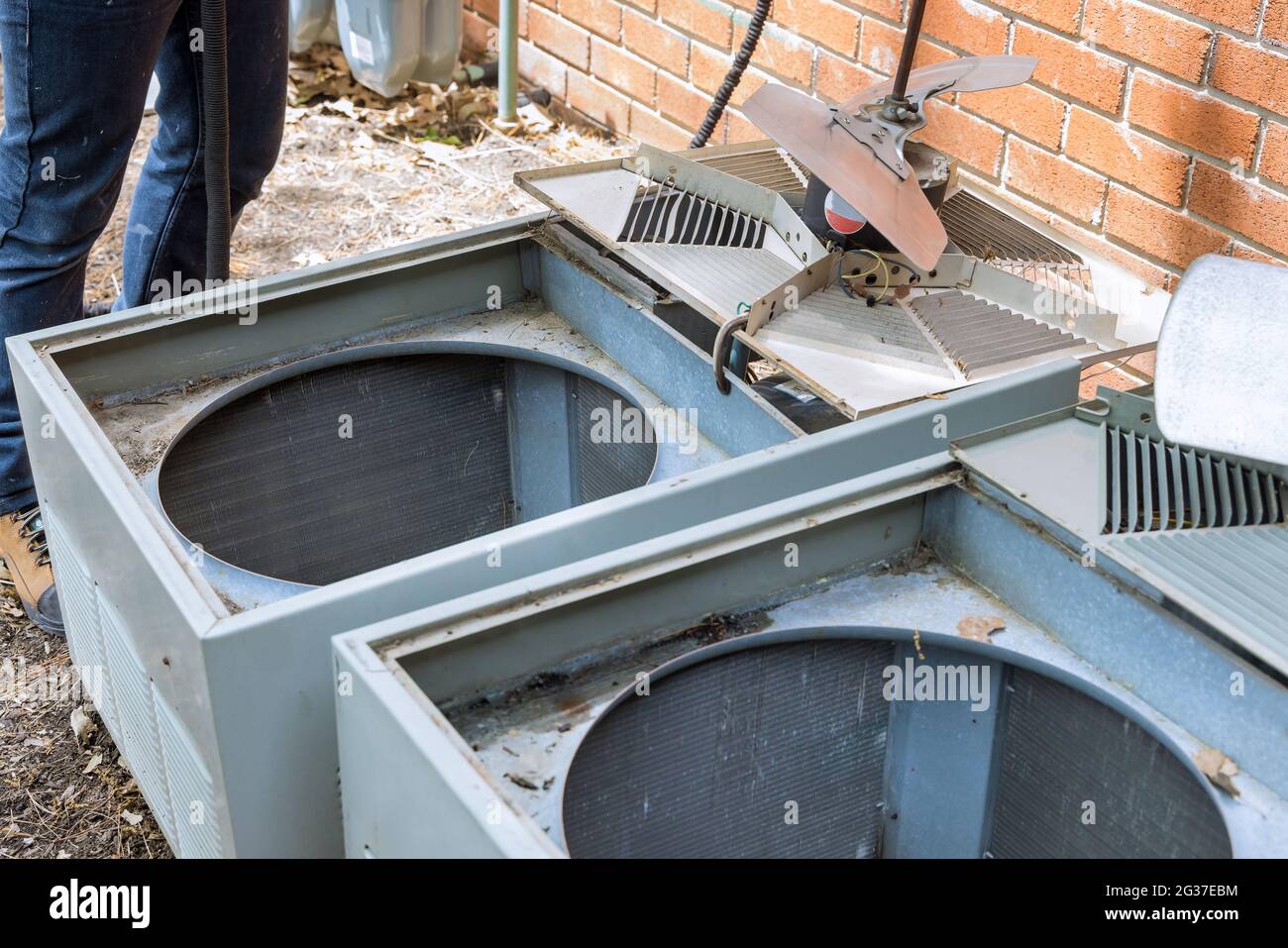 Technical service with dirty clogged air conditioner condenser cooling