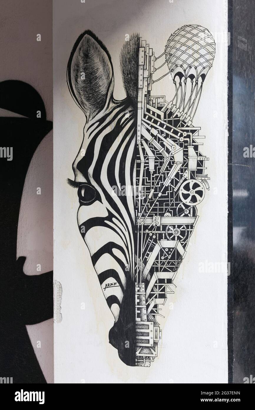 Paste up, Zebra, half animal half machine, symbol for balance of nature and technology, mechanimal by streetart artist Ardif, Duesseldorf, North Stock Photo