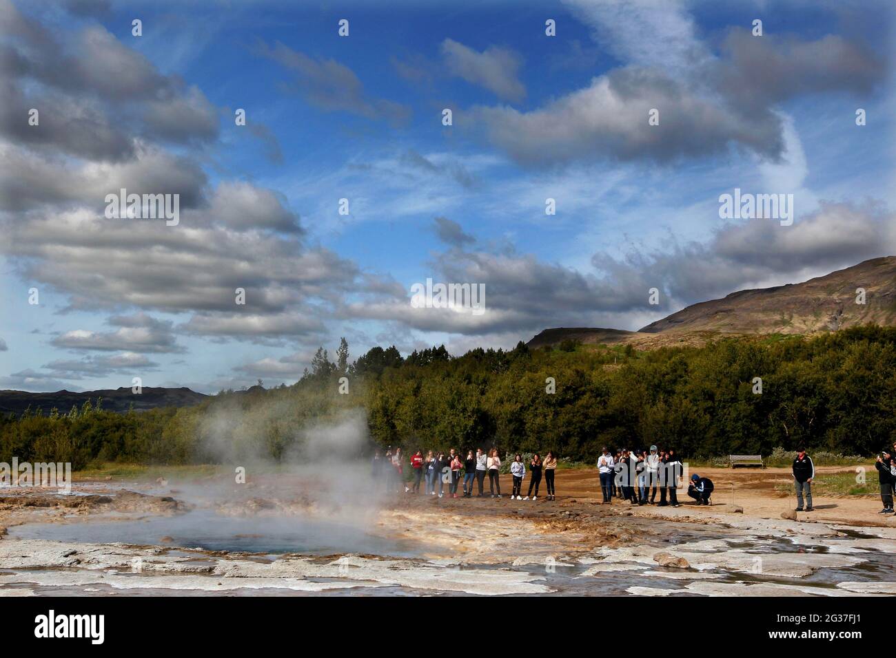 Geyser, hot spring, Strokkur, tourists, spectators, Haukadalur, geothermal area, Golden Circle, South West Iceland, Iceland Stock Photo