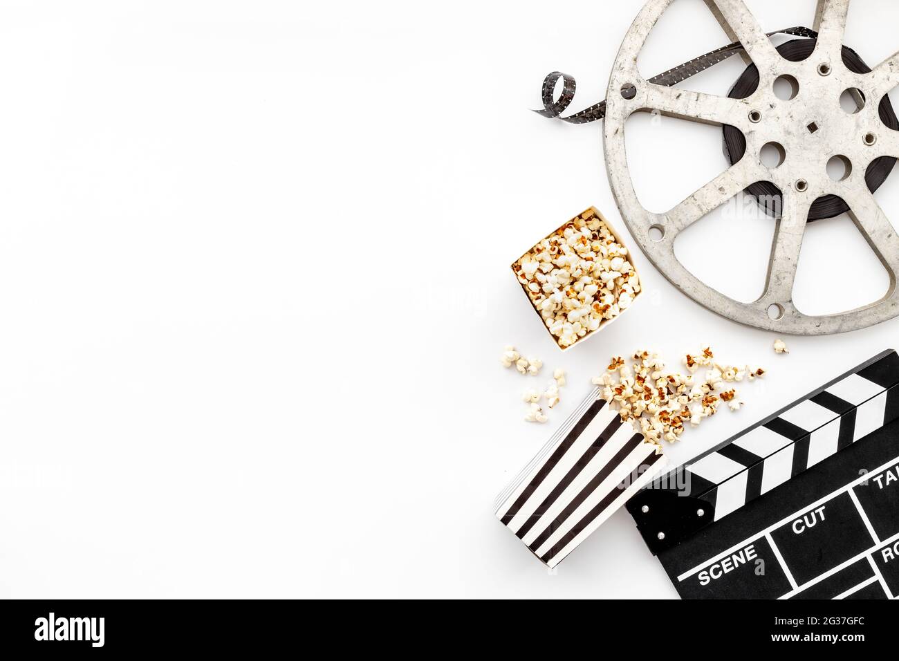 Movie Film Reel With Clapperboard And Popcorn Cinema Concept Stock Photo Alamy
