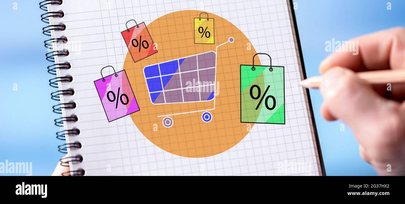Hand drawing discount concept on a notepad Stock Photo - Alamy