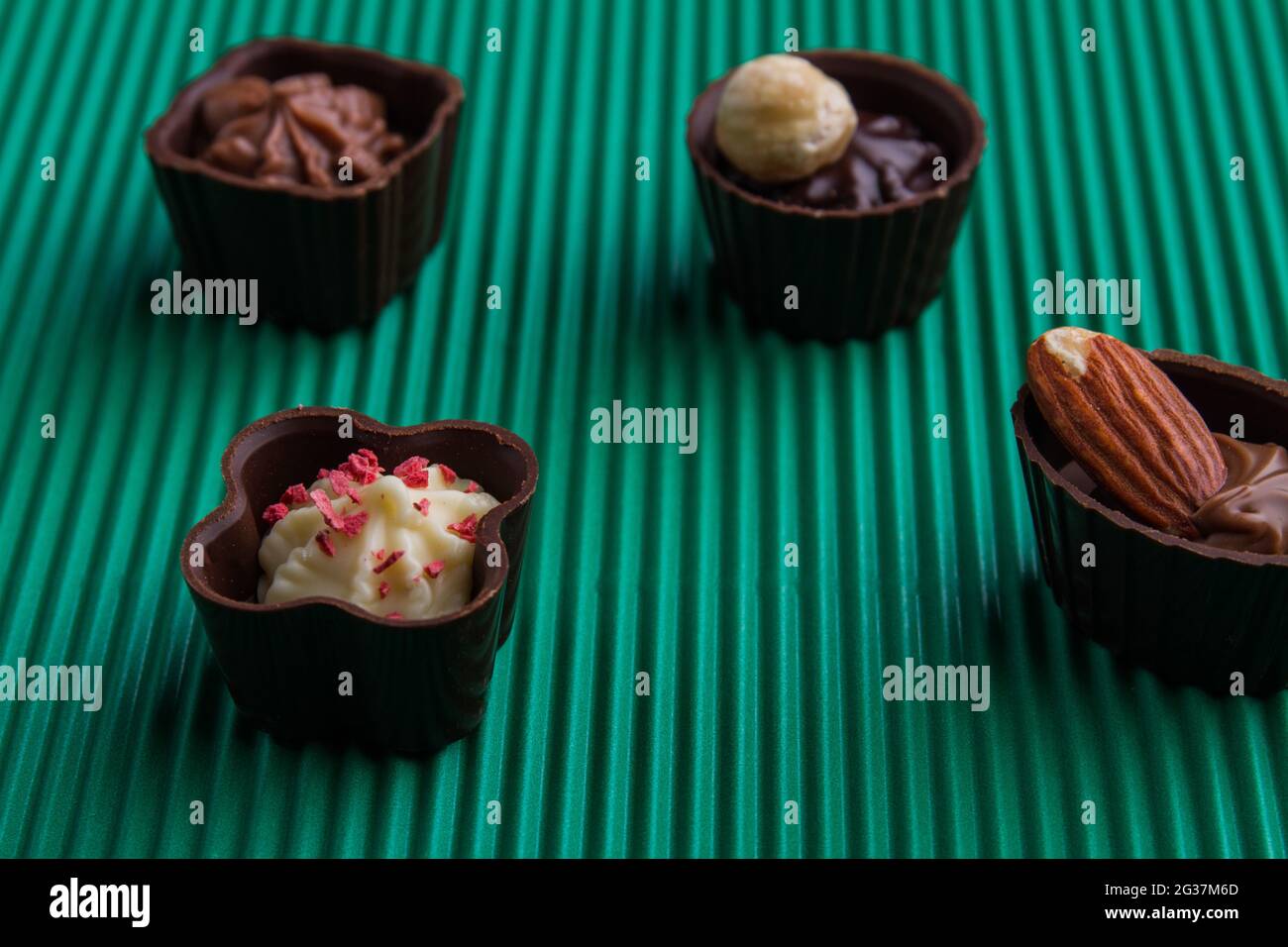 Sweet chocolate candies with various fillings close-up. Stock Photo