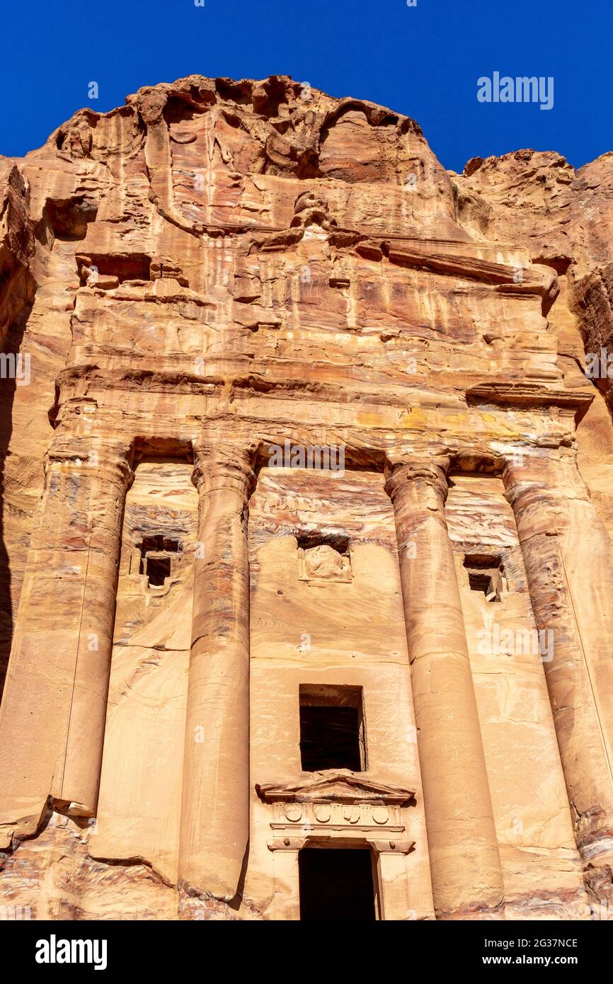 Urn tomb facade. with pediment topped by urn, columns, pilasters, built and carved in Jabal-al-Khubtha, in about AD 70, archaeological site of Petra Stock Photo