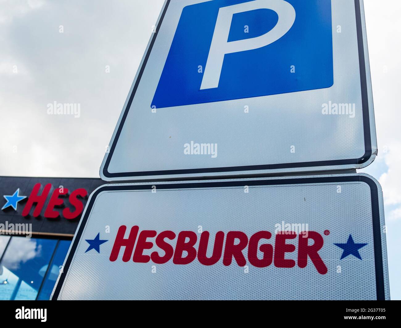 Parking of the Hesburger restaurant in the village of Shchasliv on the highway Kiev - Boryspil international airport. The Finnish restaurant chain Hesburger is actively developing in the capital region of Ukraine. Of the five hundred restaurants of this chain, seven operate in Kiev and the region. Stock Photo
