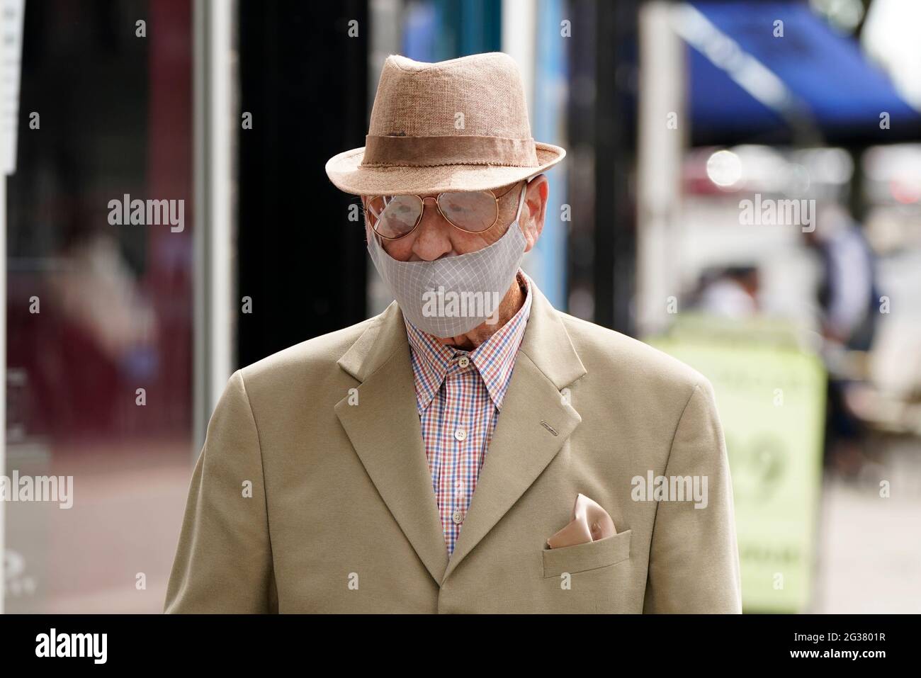 A man walks in Doncaster town centre, during the easing of lockdown restrictions in England. Picture date: Monday June 14, 2021. Stock Photo