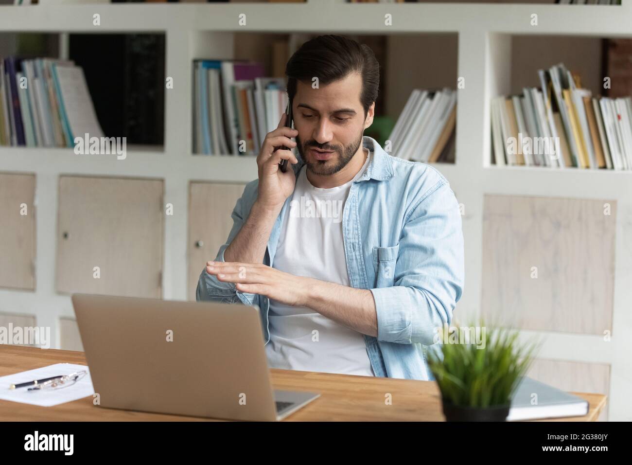 Professional young lawyer giving consultation to client by phone call