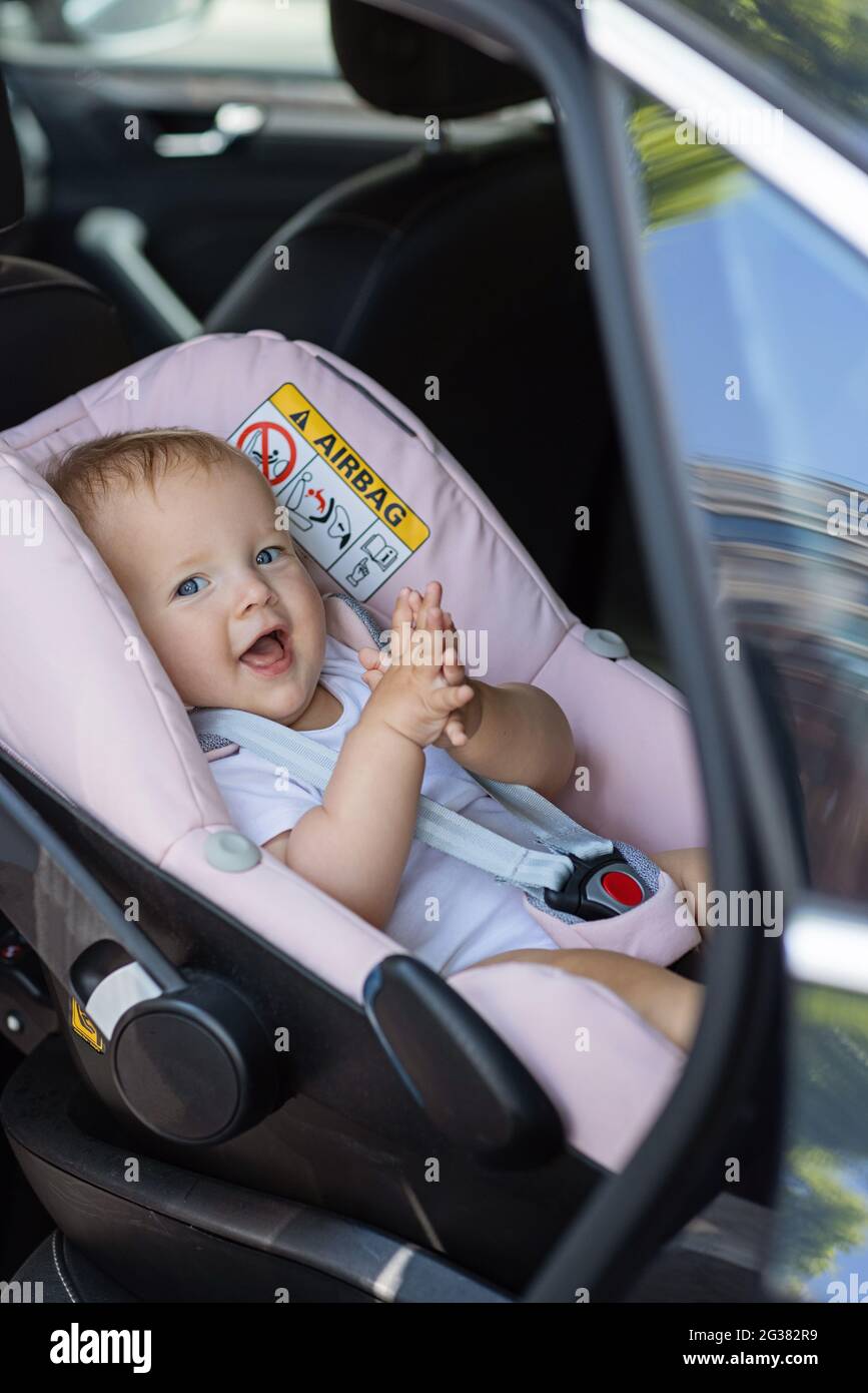 Toddler sleeping in Joie Trillo Shield Car Seat Stock Photo - Alamy