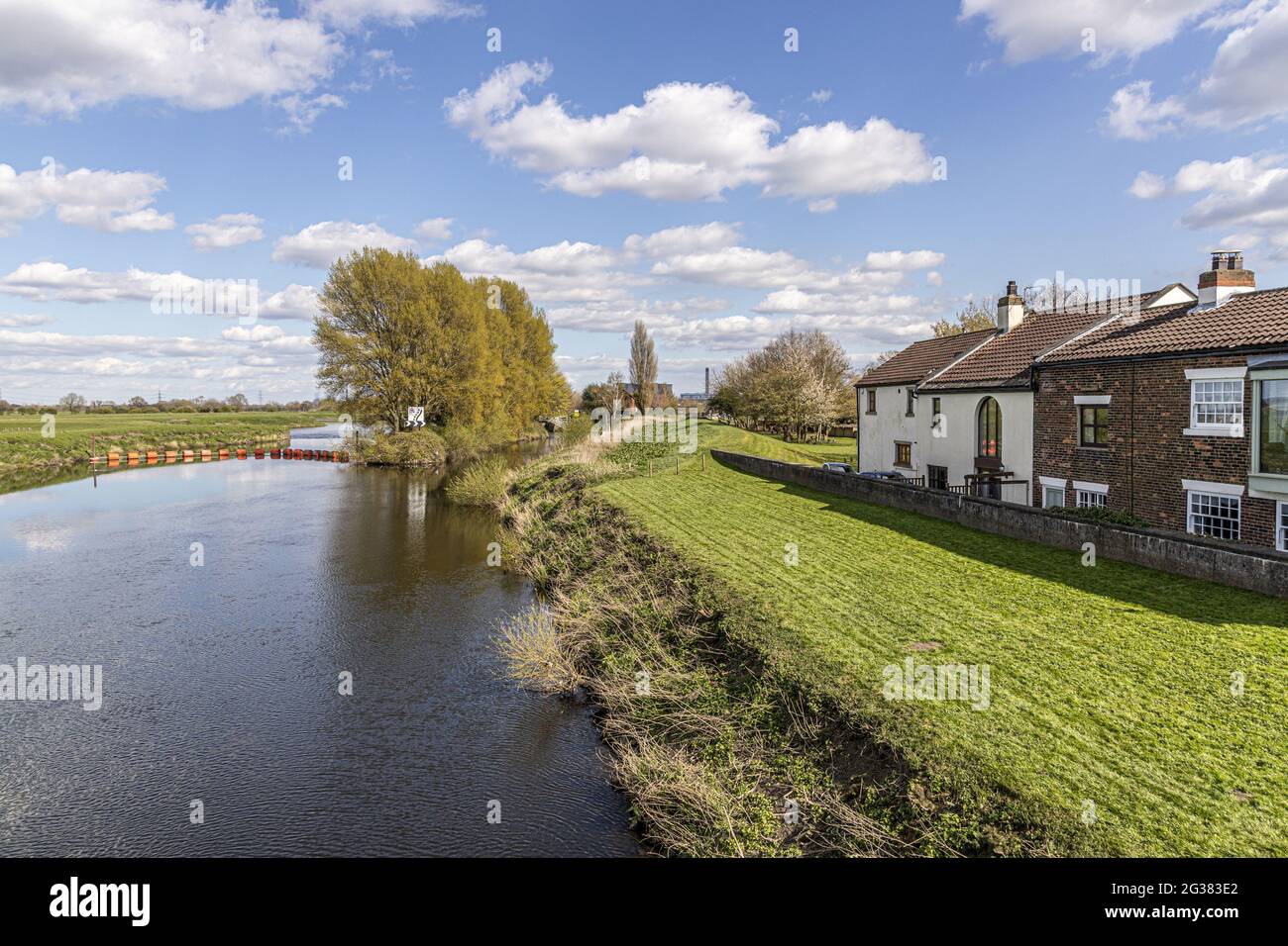 Looking East along the River Aire towards Drax Power Station from the village of Beal, North Yorkshire UK Stock Photo
