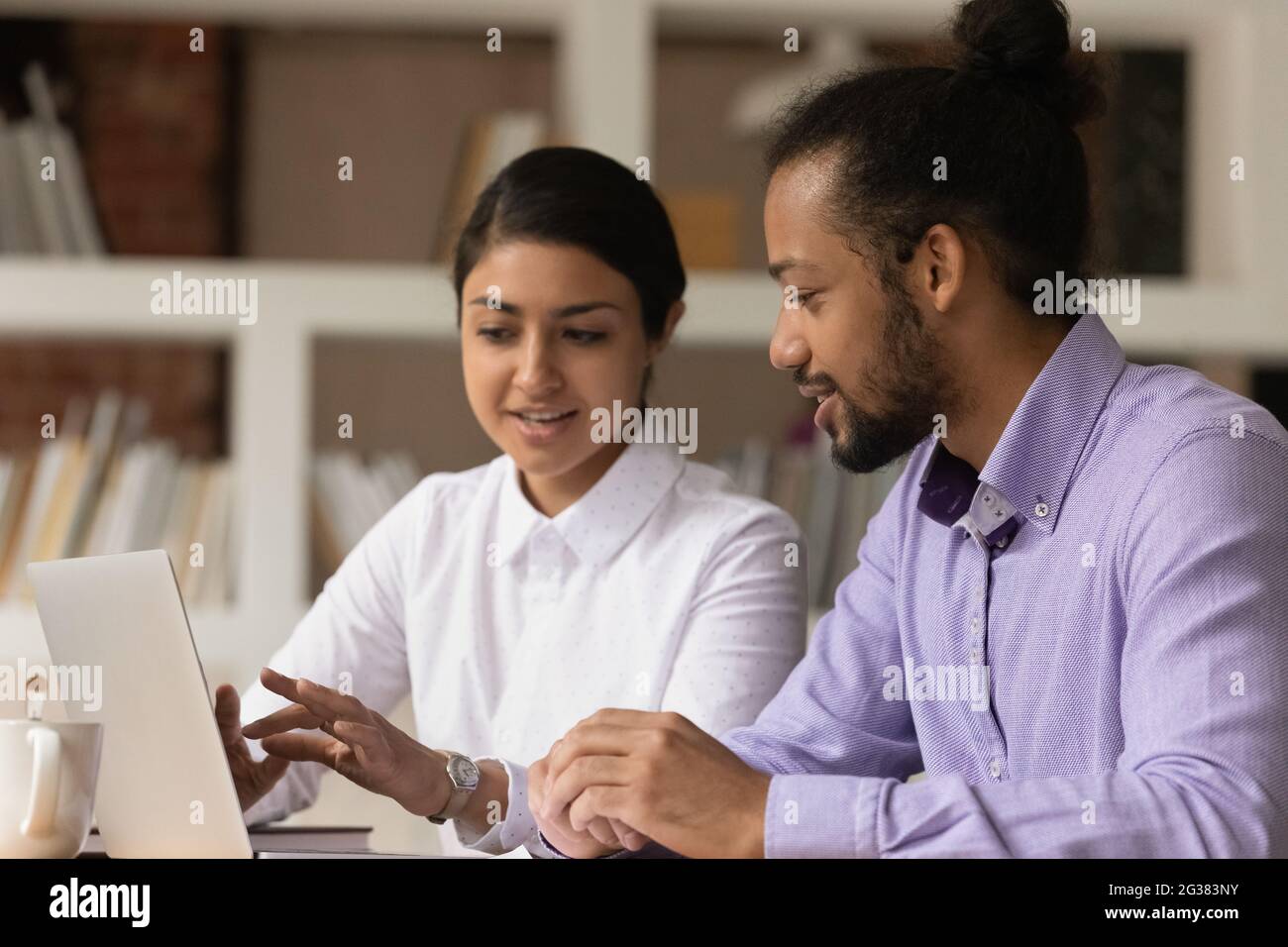Young multiracial colleagues hi-res stock photography and images - Alamy