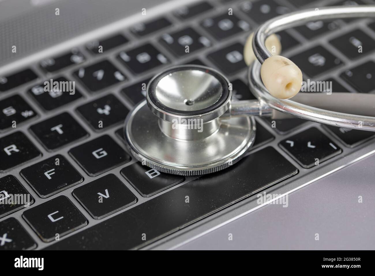 Stethoscope on Computer keyboard, maintenance and insurance  Concept Stock Photo