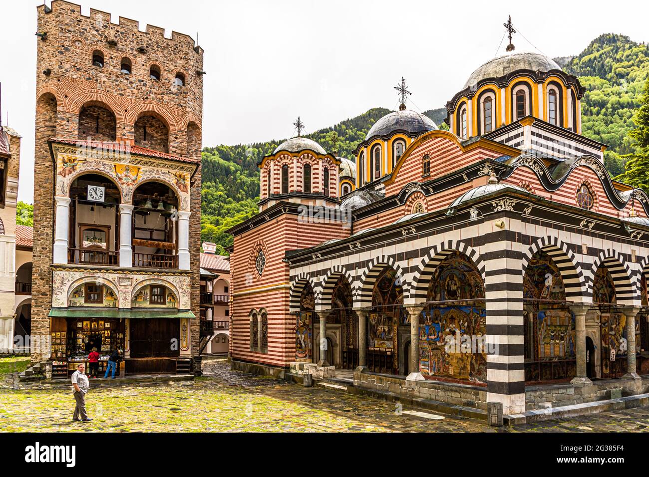 The Monastery of Saint Ivan of Rila, better known as the Rila Monastery (Bulgarian: Рилски манастир, Rilski manastir) is the largest and most famous Eastern Orthodox monastery in Bulgaria.It belongs to the UNESCO World Heritage. Chreljo, the defense tower from the 13th century stands in the courtyard and is the oldest building of the monastery Stock Photo