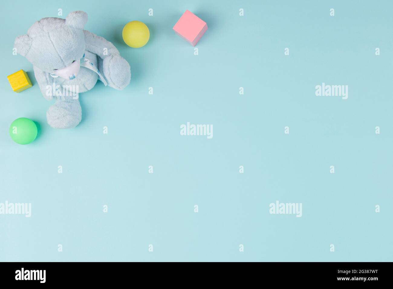 Baby Kids Toys Background With Teddy Bear Wooden Blocks And Colorful Balls On Light Blue Color Background Top View Flat Lay Stock Photo Alamy Baby Kids Toys Background With Teddy Bear Wooden Blocks And Colorful Balls On Light Blue Color Background Top View Flat Lay Stock Photo Alamy