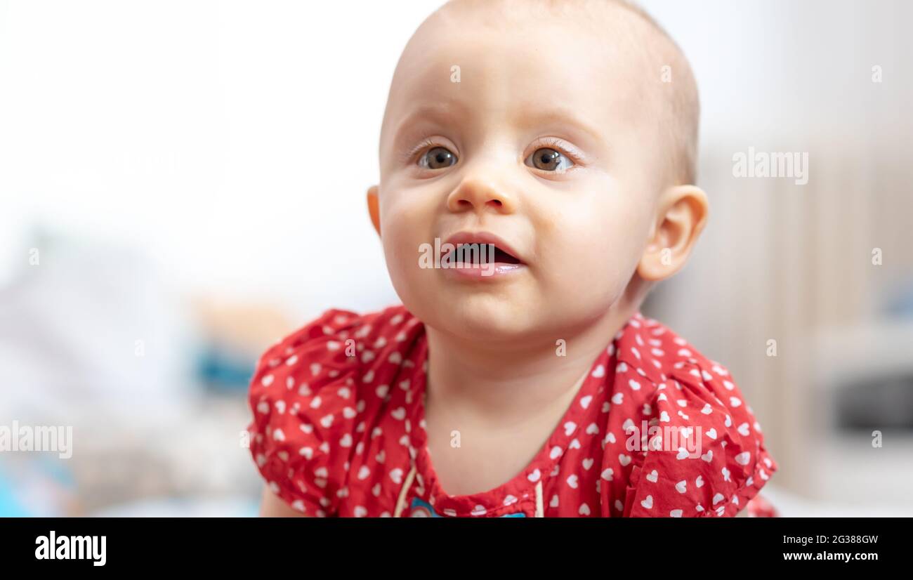 Portrait of little cute baby girl Stock Photo - Alamy