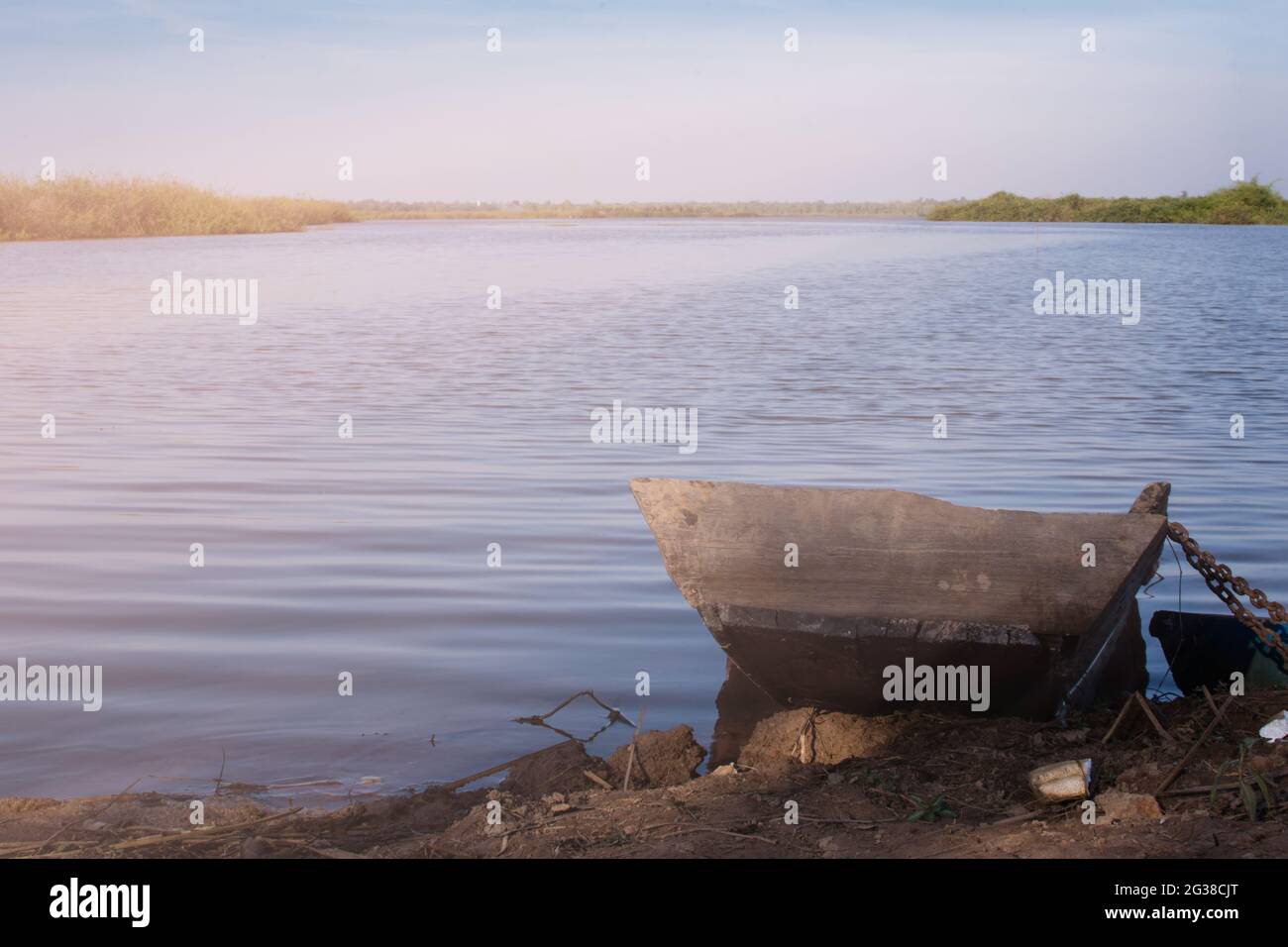 Wood boat moored on the river Stock Photo - Alamy