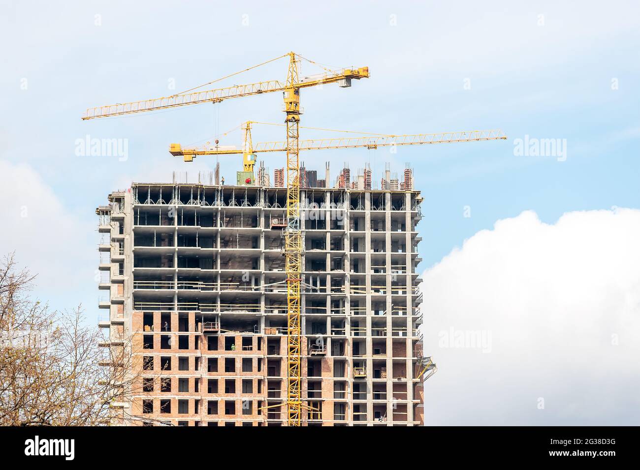 Large construction of a house with cranes in Kiev, Ukraine. Stock Photo