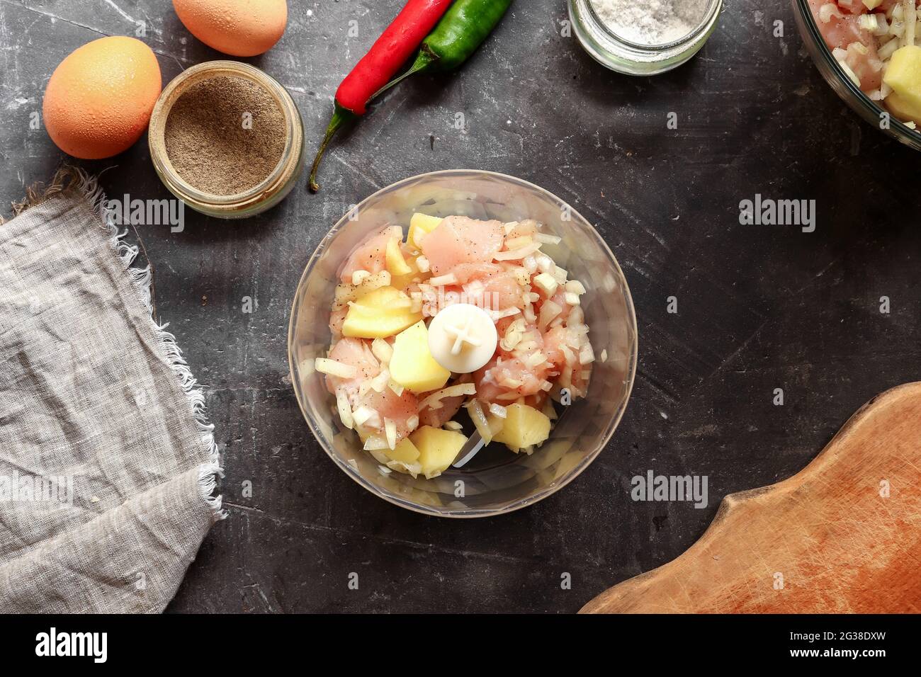 Stepbystep preparation of minced meat for chicken meatballs. Top view. Cooking process in the