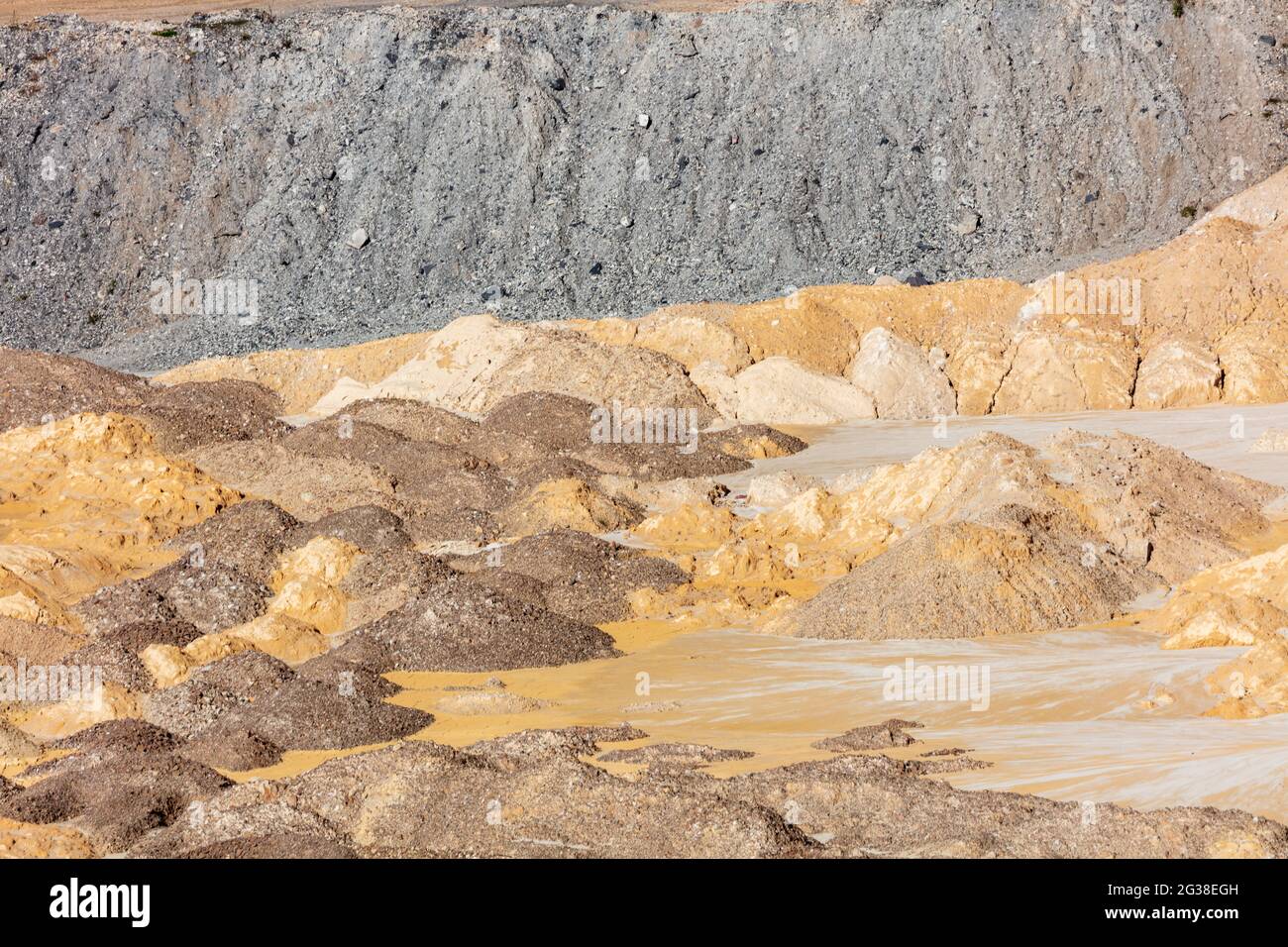 Photograph of crushed sand and stone laying on the ground in a large ...
