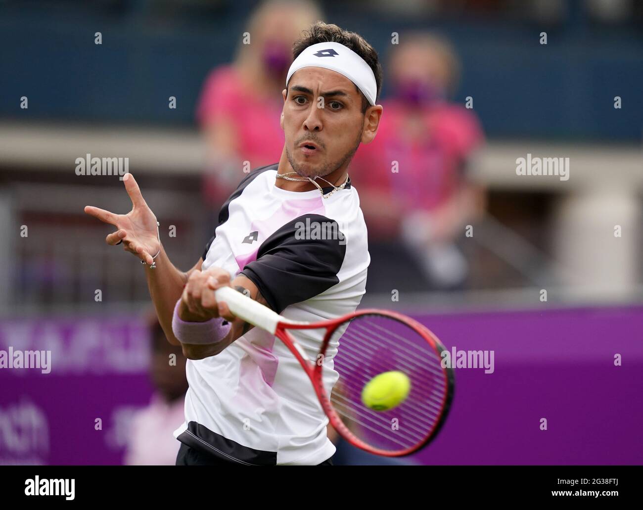 Alejandro Tabilo in action against Aslan Karatsev during day one of the  cinch Championships at The Queen's Club, London. Picture date: Monday June  14, 2021 Stock Photo - Alamy