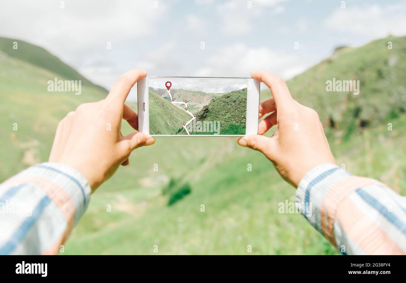 Navigating geolocation points in mountainous terrain. Stock Photo