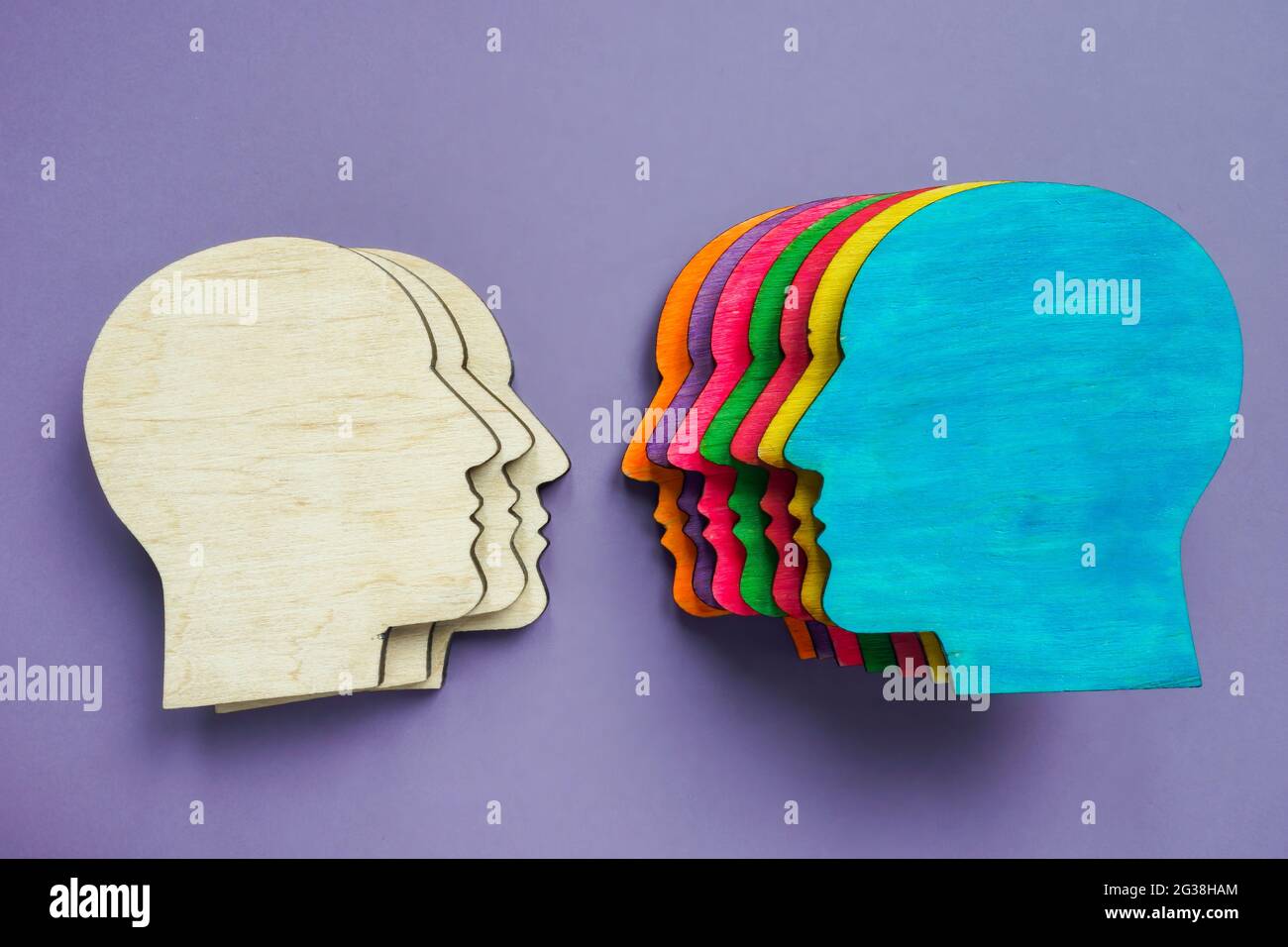 Equality and diversity concept. Multi-colored figurines of heads. Stock Photo