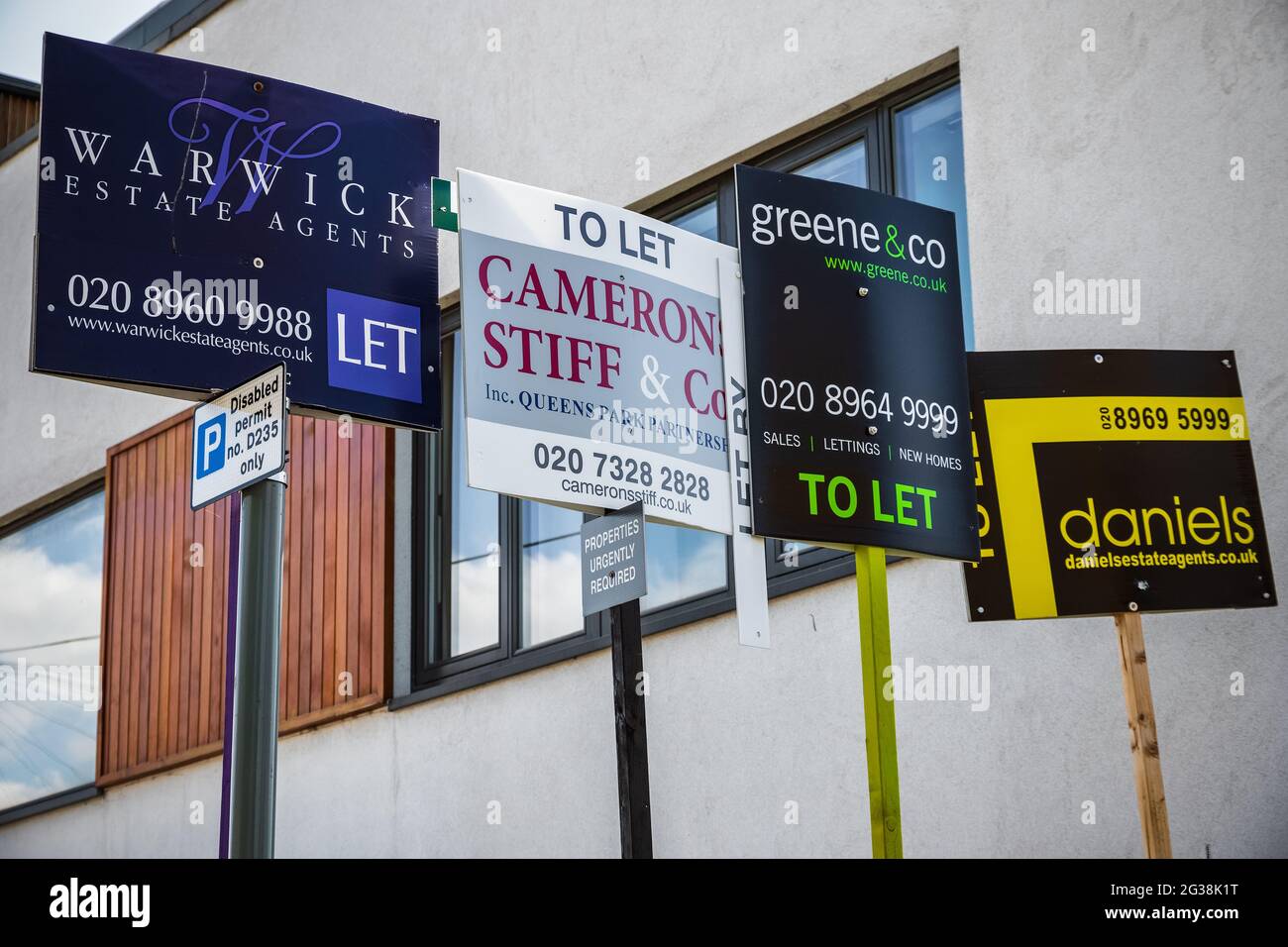 London, UK 10 May, 2021 Estate agent signs advertising home for rent or sale around Kensal