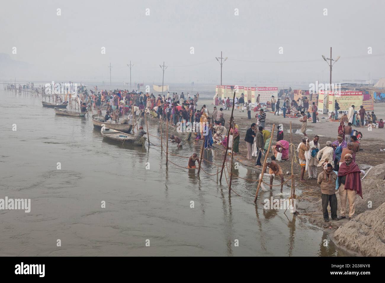People bathing in the Ganges River at the Kumbh Mela in India Stock Photo