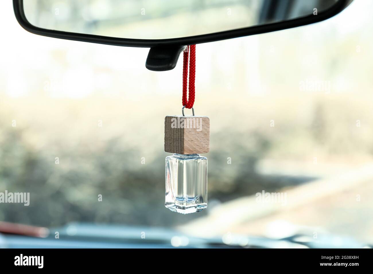 Air freshener hanging in car, closeup Stock Photo - Alamy