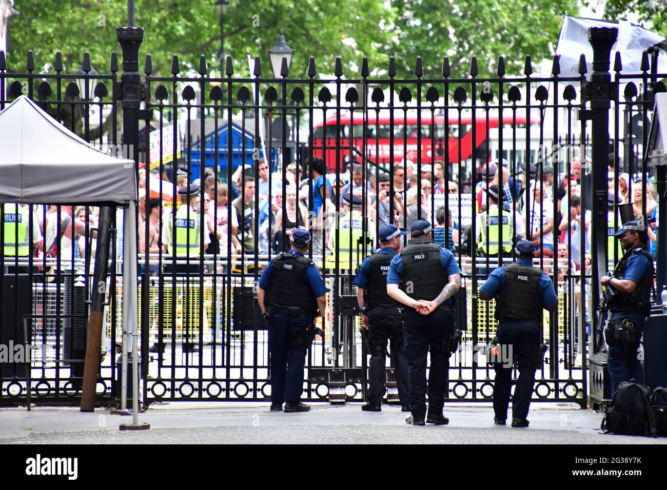 London, UK. 14th June, 2021. Protestors continue to protest until Boris Johnson confirms the delayed lockdown until July 19 outside Downing street on 14th June 2021, London, UK. Credit: Picture Capital/Alamy Live News Stock Photo