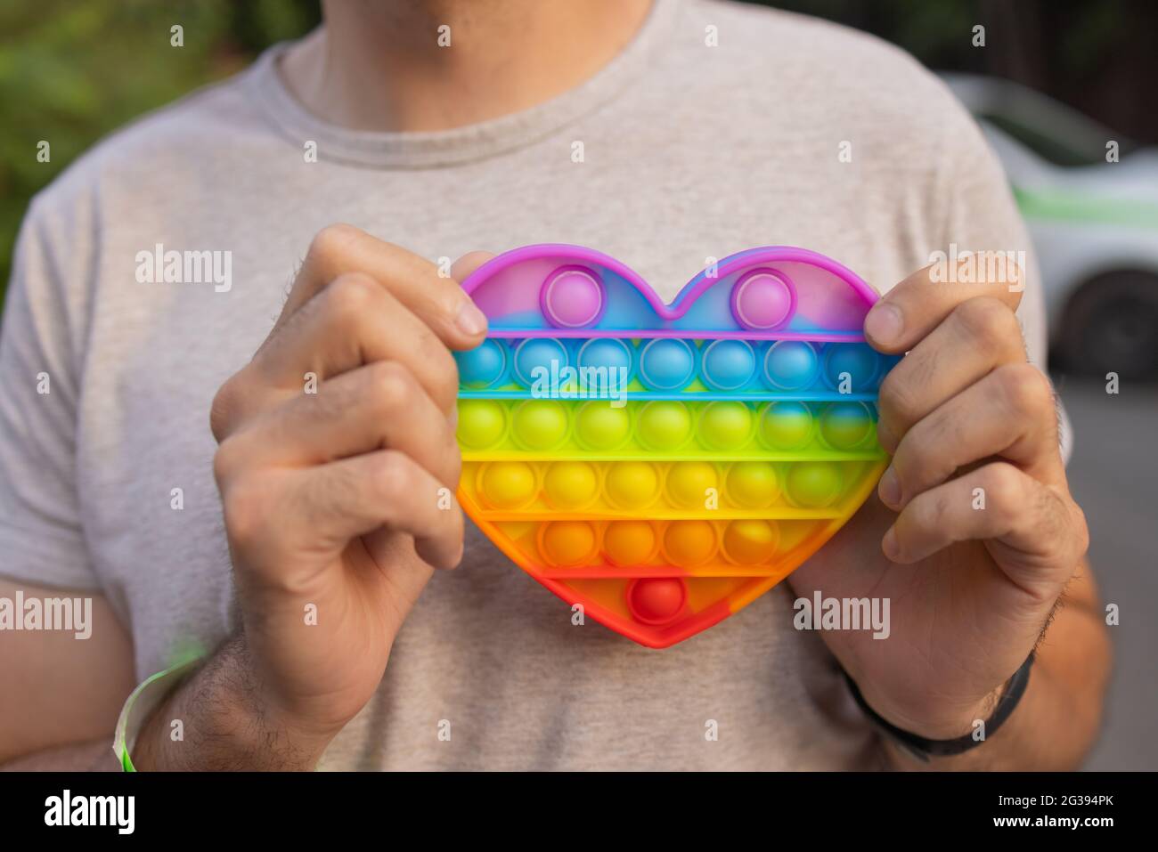 man using pop it fidget toy closeup Stock Photo - Alamy
