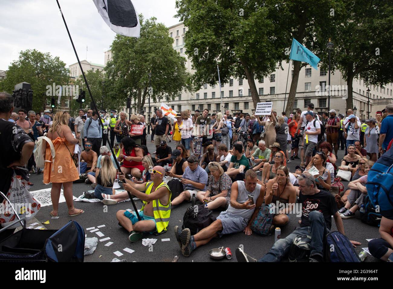 London, UK. 14th June 2021. Anti-vaxx protesters gather outside Downing Street. Yuen Ching Ng/Alamy Live News Stock Photo